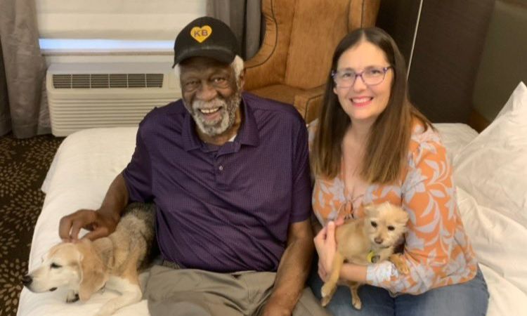 Marilyn Nault's widowed husband, Bill Russell, his fourth wife Jeanine Fiorito, and their dogs.